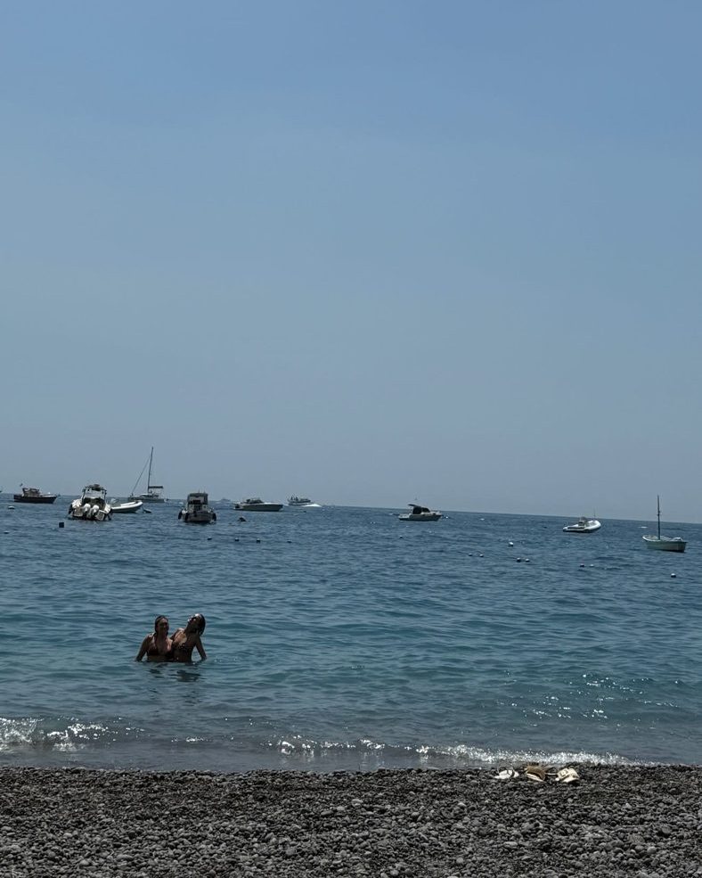 Swimmers and boats on the Italian coast, posted to LeadAbroad's story